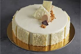 Cocorico By Maison Kayser Passion Fruit Mousse Coconut Creme Brulee Center Coconut Biscuit Topped With White Cho Passion Fruit Mousse Coconut Biscuits Cake