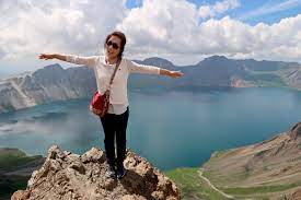 Volcanic rocky mountains and lake tianchi, national park changbaishan mountain.this landmark close to north korea.east of changbai mountain belong to north korea and other parts belong to china territory. North Korean Scenery Young Pioneer Tours