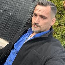 Is a man in a relationship with a transgender woman considered gay?