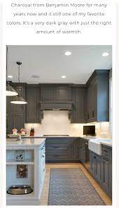 Fantastic kitchen with lower cabinets painted benjamin moore kendall charcoal and upper cabinets painted white dove. Bm Kendall Charcoal Darker Cabinet Color Charcoal Kitchen Kitchen Cabinet Colors Kitchen Remodel
