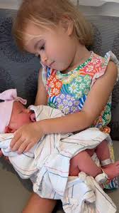 And just like that… we’re a family of five!, Welcome to the world, Paige  Harper Adrian. 7 lbs 8 oz, 21 inches of pure love. You’ve already found  your place right alongside your proud big sisters.