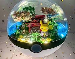 Pin By Thien An On Pokemon In 2020 Pokemon Terrarium Pokemon Diy Diy Arts And Crafts