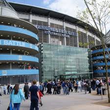 +44 (0) 161 444 1894 manchester city moved into the etihad stadium, formerly known as the city of manchester stadium, in 2003 after 80 years at their previous home, maine road. Manchester City Bid For Whopping 60 000 Capacity At Etihad Stadium With Consultation Seeking Your Views Mancunian Matters