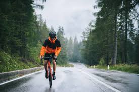 Image result for rain cyclist