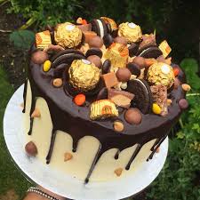 Your wedding cake doesn't have to be vanilla, and we mean that in both the literal and metaphorical sense. Chocolate Fudge Cake Filled With Vanilla Buttercream Topped With A Chocolate Ganache And Reeses Pieces Ferrero Ro Fudge Cake Filling No Bake Cake Cake Recipes