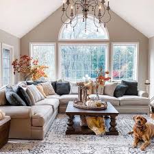 The clear, waterfall coffee table was selected to keep the space open, while the moroccan storage ottomans were used to store toys and provide additional seating. Farmhouse Living Room Decor Ideas That You Can Incorporate In Your Own Home Farmhousehub