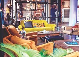 Canvas Hotel S Lobby Includes Plushy Seating A Baby Grand Piano Billiards A Bar And Dining Meeting Event Space At Chef Canvas Farmhouse Dining Chairs Hotel