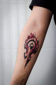 World of warcraft inspired horde tattoo. My First Ink Horde Watercolor Tattoo Horde Tattoo Gaming Tattoo Tattoos