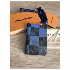 The svelte pocket organizer can be slipped into a briefcase or bag to keep small items safely stowed away when traveling. Louis Vuitton Louis Vuitton Damier Graphite Giant Blue Pocket Organizer Wallets Small Accessories Leather Black Blue Ref 223290 Joli Closet
