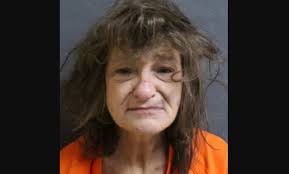 Grove Woman Charged with Murder