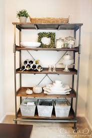 You'll have ample storage space inside this sideboard, and the double sliding doors make it easy to access. Pleasantly Surprised A New Dining Room Display Shelf Jones Design Company Dining Room Shelves Dining Room Industrial Dining Room Decor