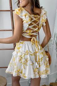 Cute sundresses for women and juniors. White And Yellow Floral Short Dress With Strappy Back Short Dresses Saved By The Dress