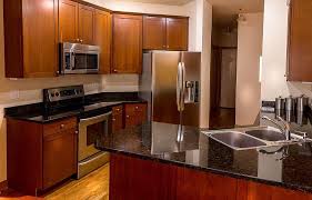 A beautiful and charming design will make your kitchen feel attractive and will make you comfortable in preparing your family meals. Kitchen Cabinets Countertop Granite Cherry Wood Stainless Steel Appliances Microwave Stove Range Refrigerator Sink Pikist