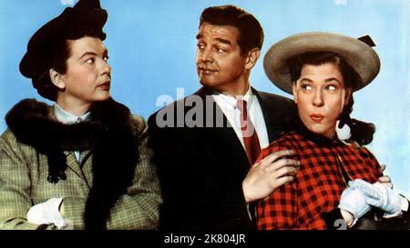 Jacqueline Dewit, Robert Lowery & Judy Canova Film: Lay That Rifle Down  (1955) Characters: Aunt Sarah Greeb,Nick Stokes, aka Poindexter March, III  & Judy Canova Director: Charles Lamont 07 July 1955 **WARNING** This  Photograph is for editorial ...