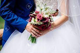 We would like to show you a description here but the site won't allow us. Beautiful Wedding Bouquet Of Burgundy Flowers In Bride S And Groom S Hands Stock Photo Picture And Royalty Free Image Image 77041126