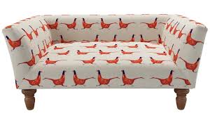 The best elevated dog beds are covered with a mesh like fabric that allows air to pass through so in a cold or draughty house, a blanket or cushion would keep the dog warm while still benefiting from the springiness of the bed. Best Dog Bed The Cosiest Cots And Couches For Your Canine Companion Expert Reviews