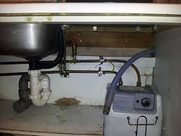A safer alternative is to make a temporary drain connection by hooking the drain hose over the rim of the sink and clamping it in place. How Can I Connect This Washing Machine Outlet To The Drain Home Improvement Stack Exchange