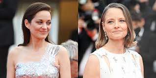 Adam driver, from left, marion cotillard and director leos carax pose for photographers at the photo call for the film annette at the 74th international film festival, cannes, southern france, tuesday, july 6, 2021. Lah01f3wjves2m