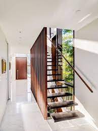 Timber Slats Cover The Upper Floor Of This Contemporary Home In Vancouver Floating House Wooden Stairs Staircase Design