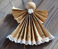 Diy Weihnachtsdekoration Aus Notenpapier Und Buchseiten Basteln Mit Alten Buchern Weihnachtsdekoration Notenpapier