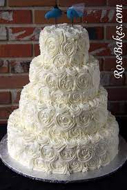 Ivory Buttercream Roses Wedding Cake With Lovebirds Cake Topper Wedding Cake Roses Buttercream Wedding Cake Simple Wedding Cake