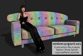 Lappalainen's black dots mobile, $292.22 via their etsy shop, hangs in the work area. Second Life Marketplace Hanau Rainbow Leopard Sofa Boxed