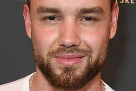 Jacqueline Jossa soaks up the sun in cutout swimsuit during beach day with  two daughters