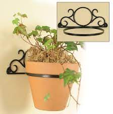 Whether you mount them on the ceiling so the pans hang from above, or you fix the rack to the wall. Image Result For Wall Mounted Plant Pot Holder Paisajismo Tres Gatos Gatos