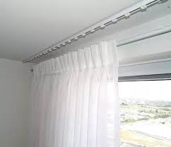 Measure from the floor on both sides of the shower enclosure to. How To Install A Curtain Rod In A Home Without Drilling Quora
