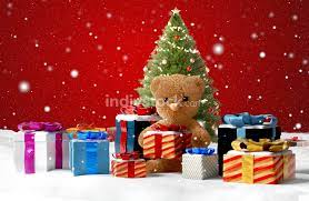 Yellow octopus makes christmas easy! Concept Of Christmas Presents Christmas Gifts And Cute Teddy Be Backgrounds Textures Indivstock