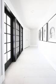 And they can look great! Modern Ranch House Hallway Gallery Wall Classy Clutter