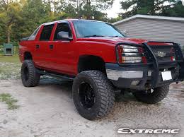 2003 chevrolet avalanche 1500 38x15 5r20 nitto tires rough country 6 inch non torsion drop suspension lift system 38x15 5r20 nitto tires rough country 6