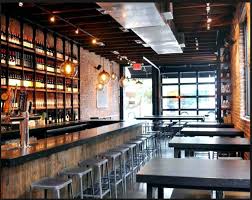 Back Bar Bar Top Garage Door High Top Tables In Bar Area Industrial Bar Design Back Bar Design Bar Design