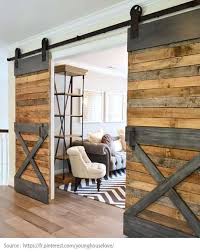Une Porte De Grange Qui S Ouvre Sur Le Salon Home Home Decor House Interior
