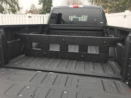 All of our bed liners guard against scratches and dents, preventing cargo from sliding around in your pickup bed. F 150 Bed Divider Bed Divider Diy Truck Bedding Truck Bed Camping