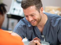 UMMC PT in the pros: Sports resident delivers care at Saints camp