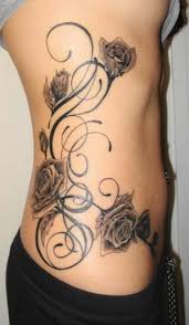 Tribal rose vine tattoo designs, 26 beautiful tribal rose tattoos only tribal, rose vine with pastels tattoo pictures tattoomagz, rose vine and bud on vine tattoo design tattoomagz, feminine flower tattoos for women Pin By Izaak Sumi On Tattoos Tribal Tattoos For Women Tattoos Vine Tattoos
