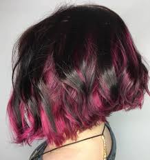 Black is very rich on its own, so make sure you match that with hot pink, fuchsia, or magenta. Picture Of A Black Wavy Angled Bob With Hot Pink Peekaboo Highlights Looks Super Contrasting