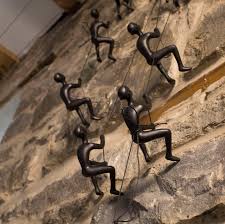 Rock climbing men sculpture wall hanging decoration wall art resin statue. Home Garden Home Decor New Man Climbing Rope Iron Bronze Metal Wall Mounted Art Sculpture Home