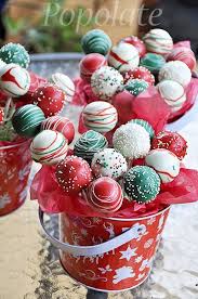 Pretty to look at and yummy to eat. Christmas Cake Pops Christmas Cake Pops Bouquet Cake Pop Recipe Christmas Deserts