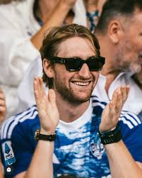 Proud to wear the Swiss jersey again🇨🇭🏒 📸 @swissicehockeyfederation &  @iihfhockey