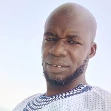 Pictures of DG Ebrima Mboob, Director General of Immigration, at today's  Mansa Kunda session.