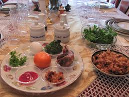 The passover service takes place at the dinner table, with the main meal inserted neatly into the middle; Charoses Setting The Passover Seder Table Goldenthal Family Blog