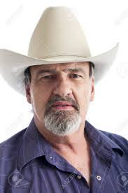 1,000+ vectors, stock photos & psd files. Adult Man Wearing A Cowboy Hat Looking Sternly At The Camera Stock Photo Picture And Royalty Free Image Image 9948389