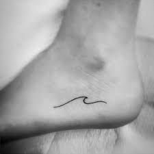 15 Refreshing Small Wave Tattoos Make A Splash With Your Choice Of Tattoo Foot Tattoos Small Foot Tattoos Tattoos