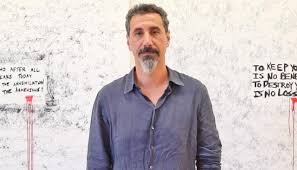 Serj tankian, from system of a down, described him as an amazing drummer and a fantastic guy. Wake Up Serj Tankian From System Of A Down S Artful Message To Kiwis On Genocide Newshub