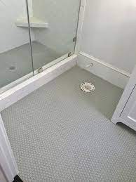 Bathroom Tile Trim Bathroom Tile Edge Trim White Ceramic Tile Shower Seat And Partial Primitive Bathroom Decor Primitive Bathrooms Penny Tiles Bathroom Floor