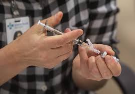 © ben nelms/cbc people cross east hastings street near main street in vancouver, british columbia on tuesday, feb. Care Home Residents Prioritized Alberta Begins Second Doses Of Covid 19 Vaccine Rmotoday Com