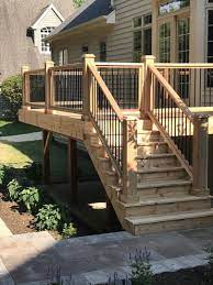 Deckorators Classic Round Balusters Gloss Black 26 10 Pack Decksdirect Deck Railing Design Building A Deck Deck Designs Backyard
