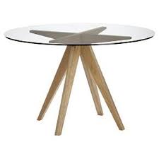Dining table with a very solid wooden construction in a nice espresso finish. Clear And Brown Teepee Dining Table